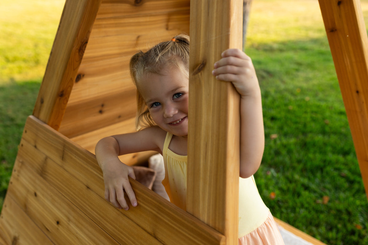 Outdoor cedar A-frame playhouse by Noble Wooden Toys, children's reading nook, 84 in. high