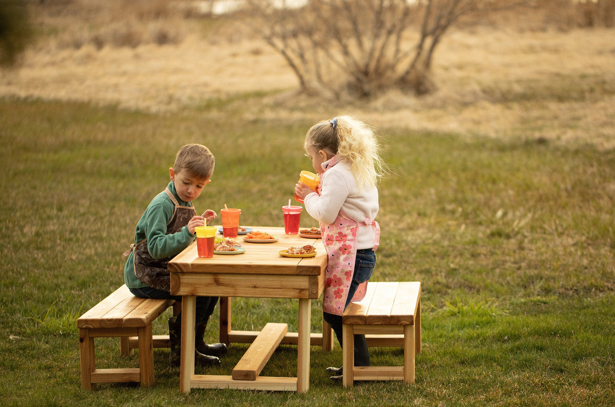 Indoor and outdoor cedar harvest table by Noble Wooden Toys for 4 children, with or without 2 benches