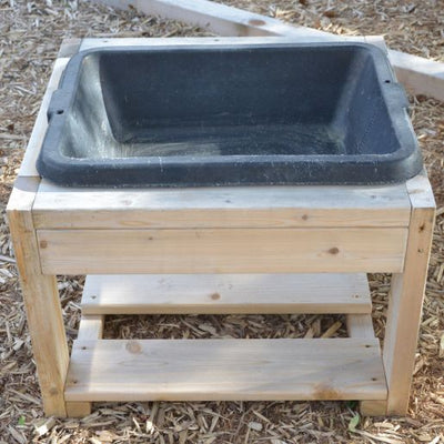 Outdoor sensory table for daycare
