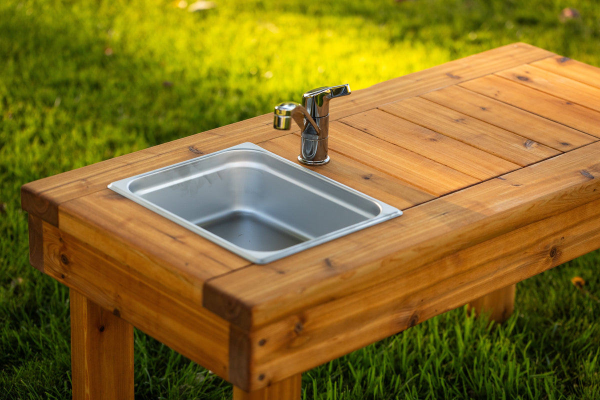 Cedar outdoor mud kitchen by Noble Wooden Toys with 1 stainless steel sink, optional faucet and shelf