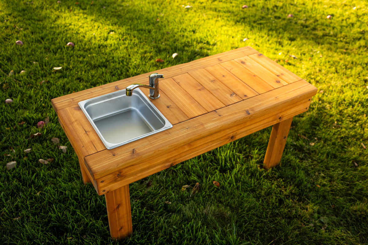 Cedar outdoor mud kitchen by Noble Wooden Toys with 1 stainless steel sink, optional faucet and shelf