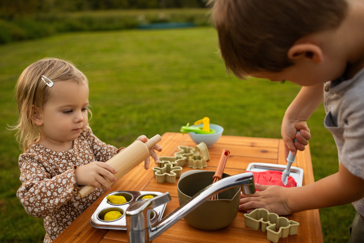 Cedar outdoor mud kitchen by Noble Wooden Toys with 1 stainless steel sink, optional faucet and shelf