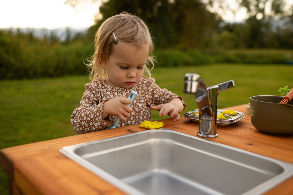 Cedar outdoor mud kitchen by Noble Wooden Toys with 1 stainless steel sink, optional faucet and shelf