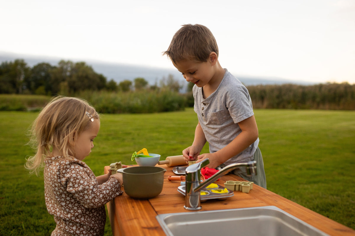 Cedar outdoor mud kitchen by Noble Wooden Toys with 1 stainless steel sink, optional faucet and shelf