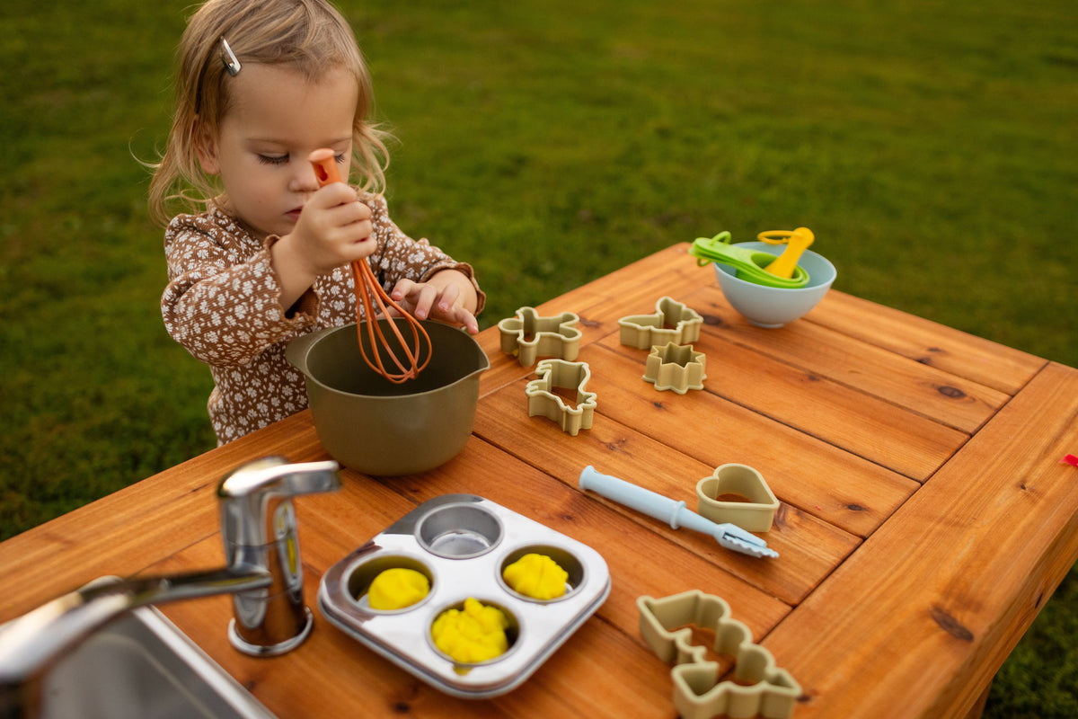 Cedar outdoor mud kitchen by Noble Wooden Toys with 1 stainless steel sink, optional faucet and shelf
