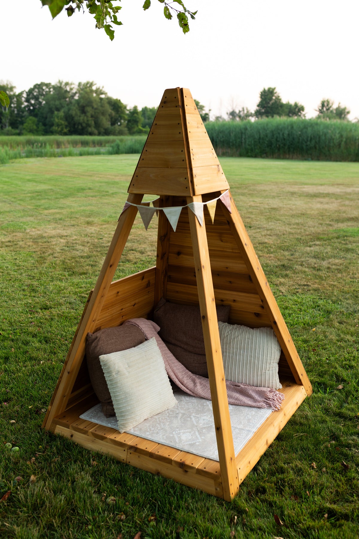 Outdoor cedar A-frame playhouse by Noble Wooden Toys, children's reading nook, 84 in. high