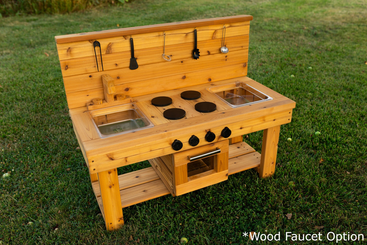Cedar outdoor mud kitchen by Noble Wooden Toys with oven, stovetop, working faucet and 2 centred clear sinks