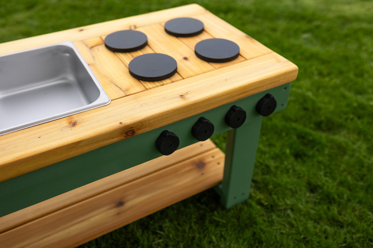 Simple painted cedar outdoor mud kitchen by Noble Wooden Toys with shelf and 2 stainless steel sinks