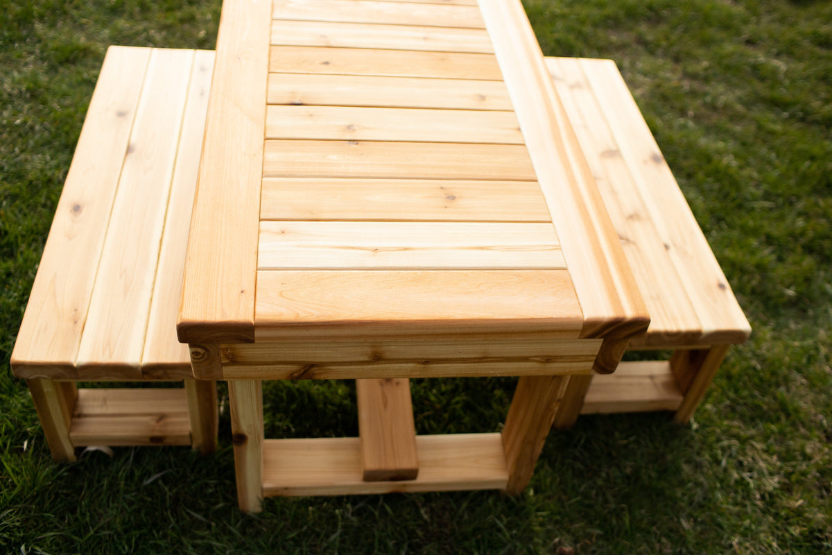 Indoor and outdoor cedar harvest table by Noble Wooden Toys for 4 children, with or without 2 benches