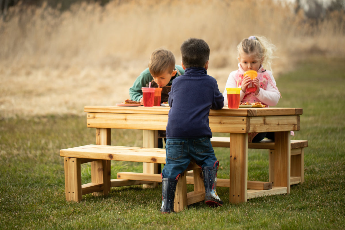 Indoor and outdoor cedar harvest table by Noble Wooden Toys for 4 children, with or without 2 benches