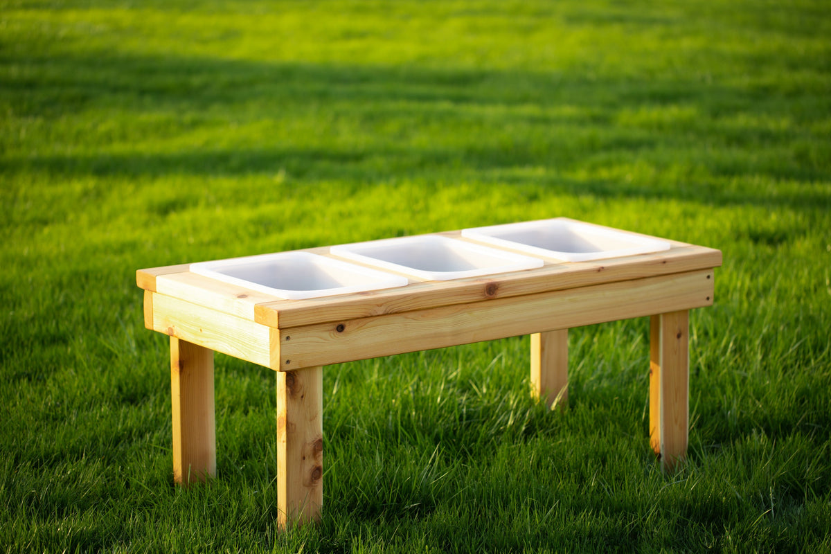 Indoor and outdoor cedar sensory table with 3 bins by Noble Wooden Toys, 45.5 in.
