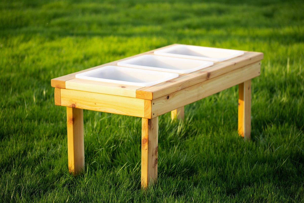 Indoor and outdoor cedar sensory table with 3 bins by Noble Wooden Toys, 45.5 in.
