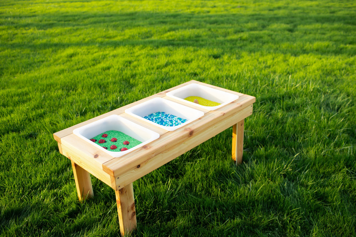 Indoor and outdoor cedar sensory table with 3 bins by Noble Wooden Toys, 45.5 in.