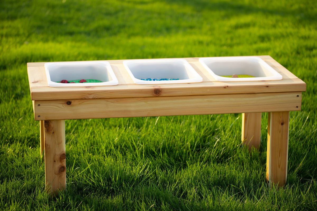 Indoor and outdoor cedar sensory table with 3 bins by Noble Wooden Toys, 45.5 in.