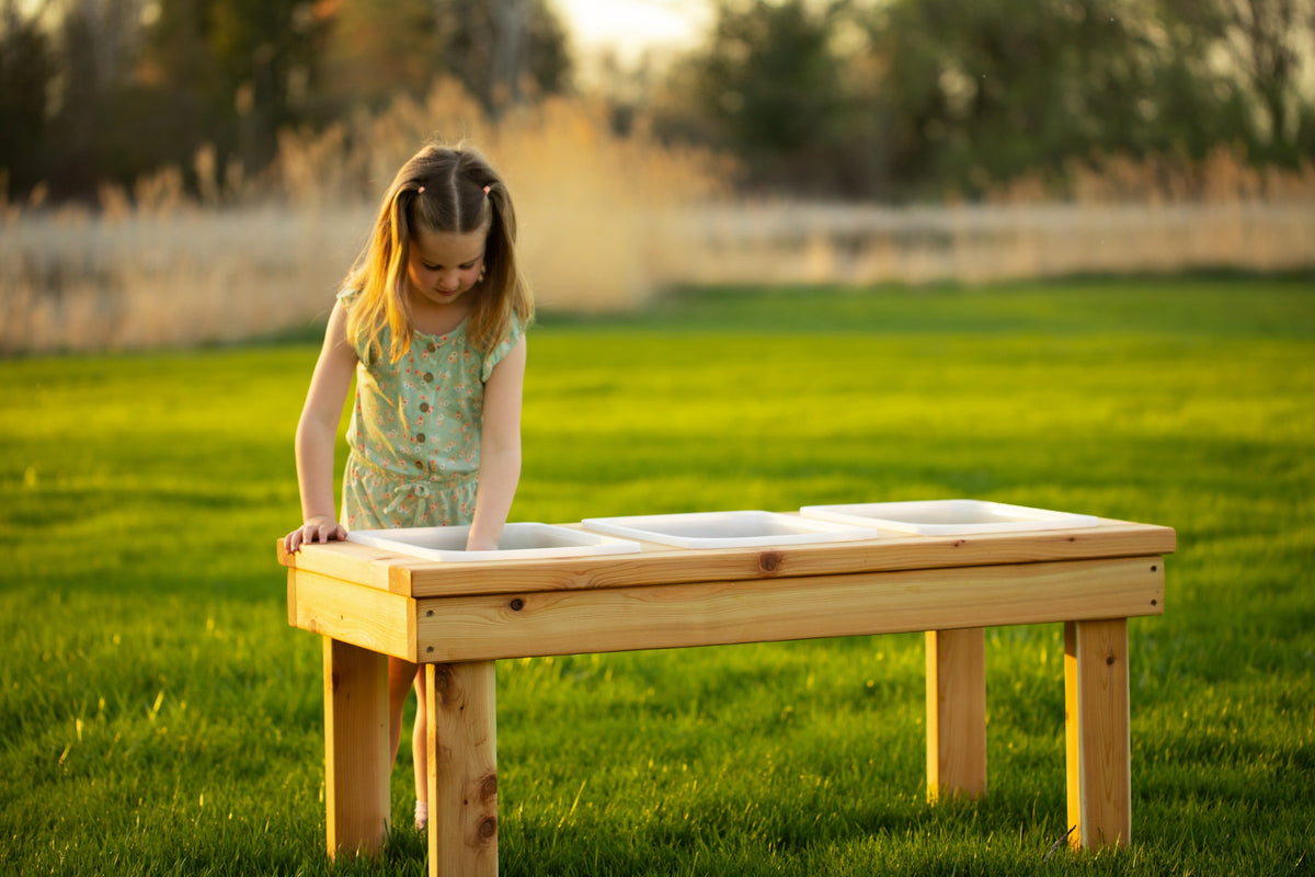 Indoor and outdoor cedar sensory table with 3 bins by Noble Wooden Toys, 45.5 in.