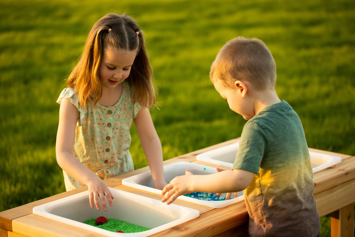 Indoor and outdoor cedar sensory table with 3 bins by Noble Wooden Toys, 45.5 in.