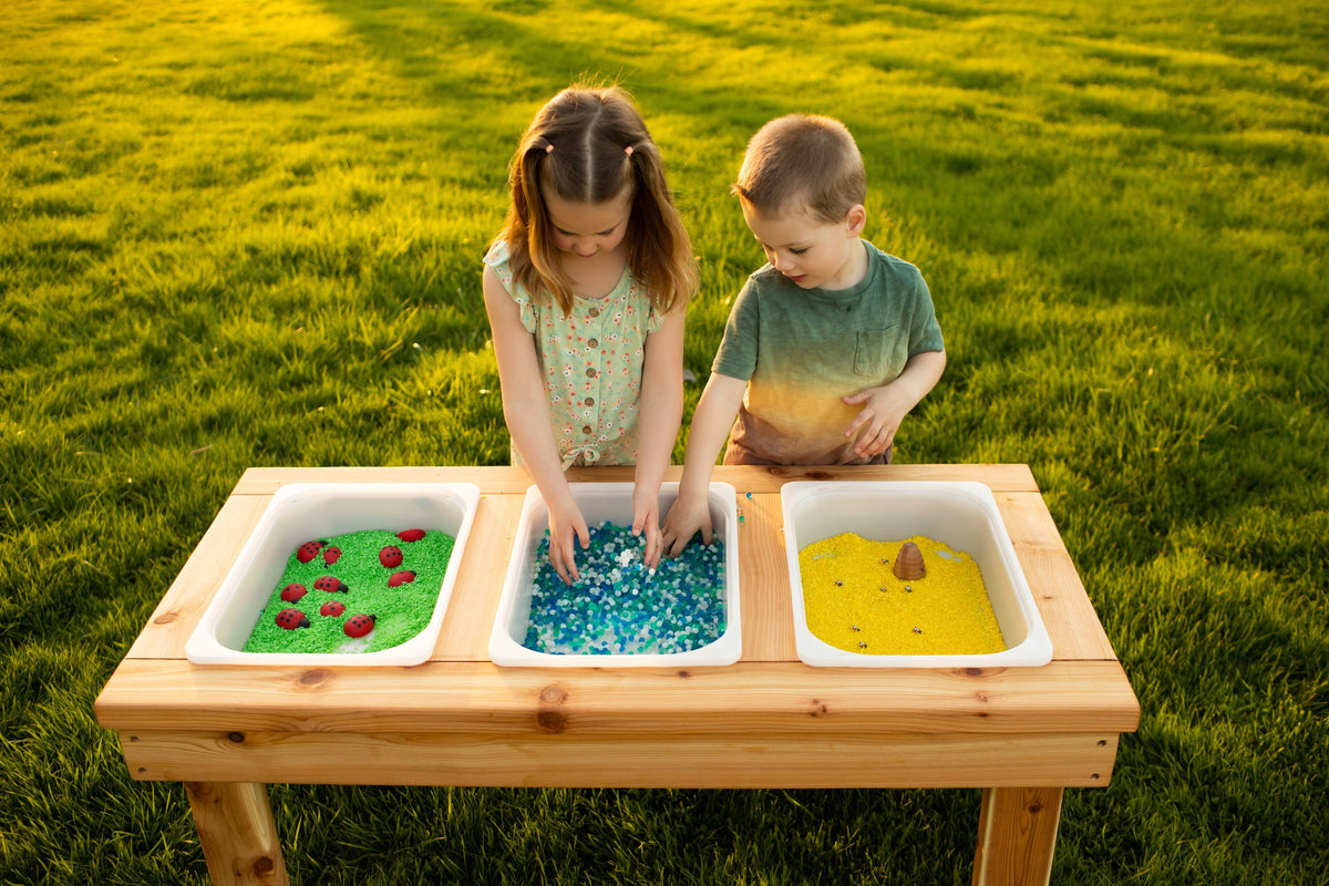 Indoor and outdoor cedar sensory table with 3 bins by Noble Wooden Toys, 45.5 in.