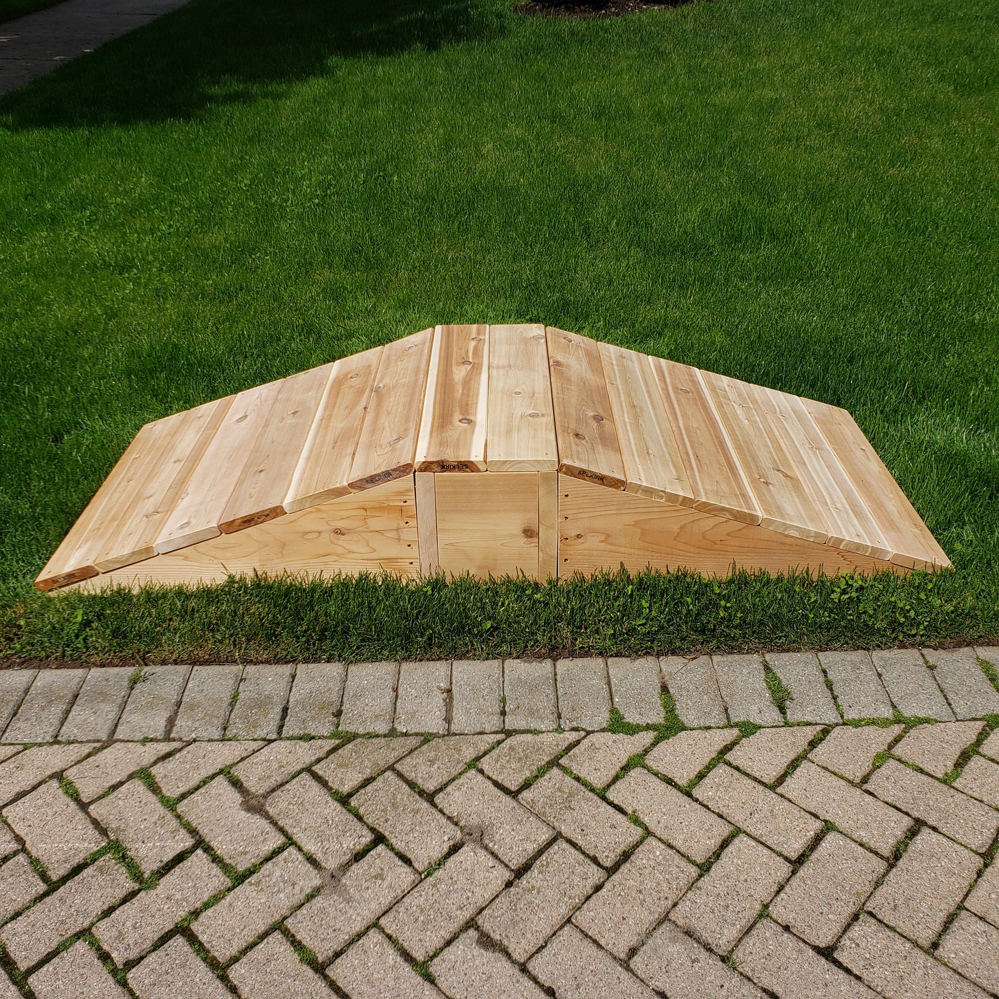 Outdoor climbing ramp