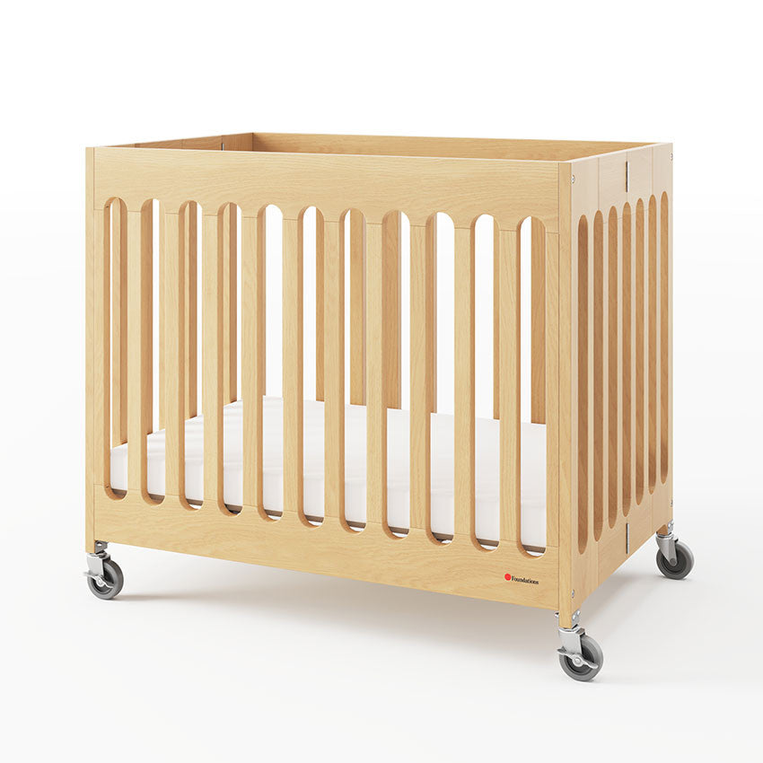 Boutique™ Compact Folding Baby Bed