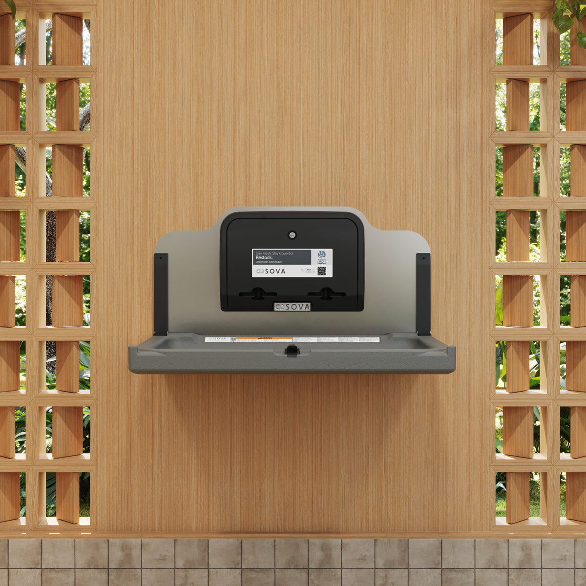 Table à langer murale Element LX avec dosseret inox et distributeur gris foncé ouverte, installée au mur
